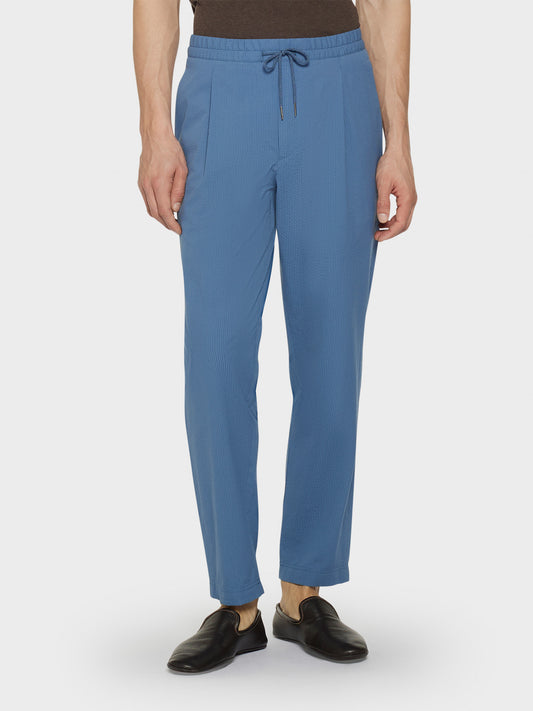 Caruso Menswear Abbigliamento Uomo Pantaloni Pantalone jogger in seersucker di cotone azzurro look 1