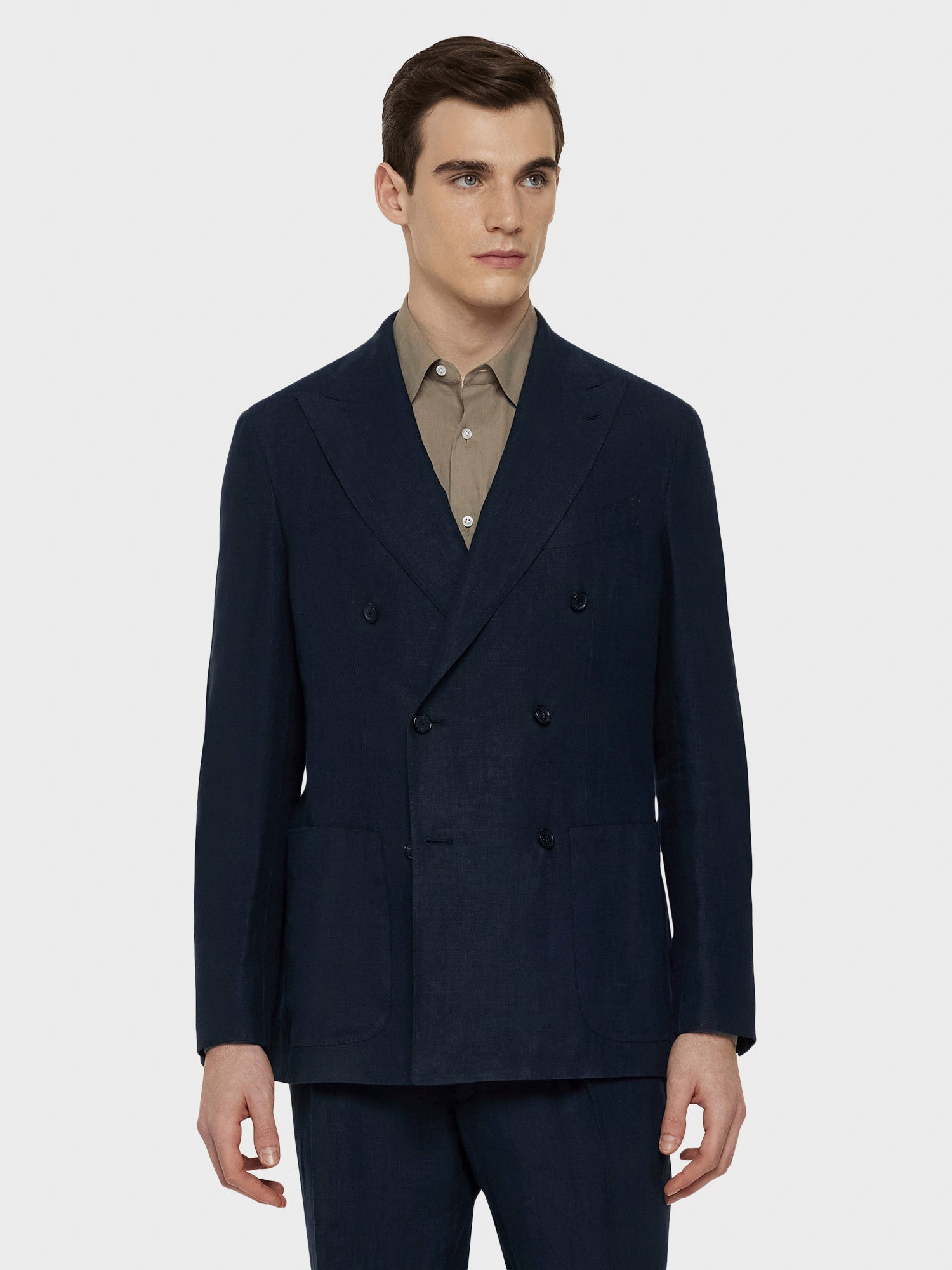 Caruso Menswear Abbigliamento Uomo Giacca aida doppiopetto in lino blu indossato front