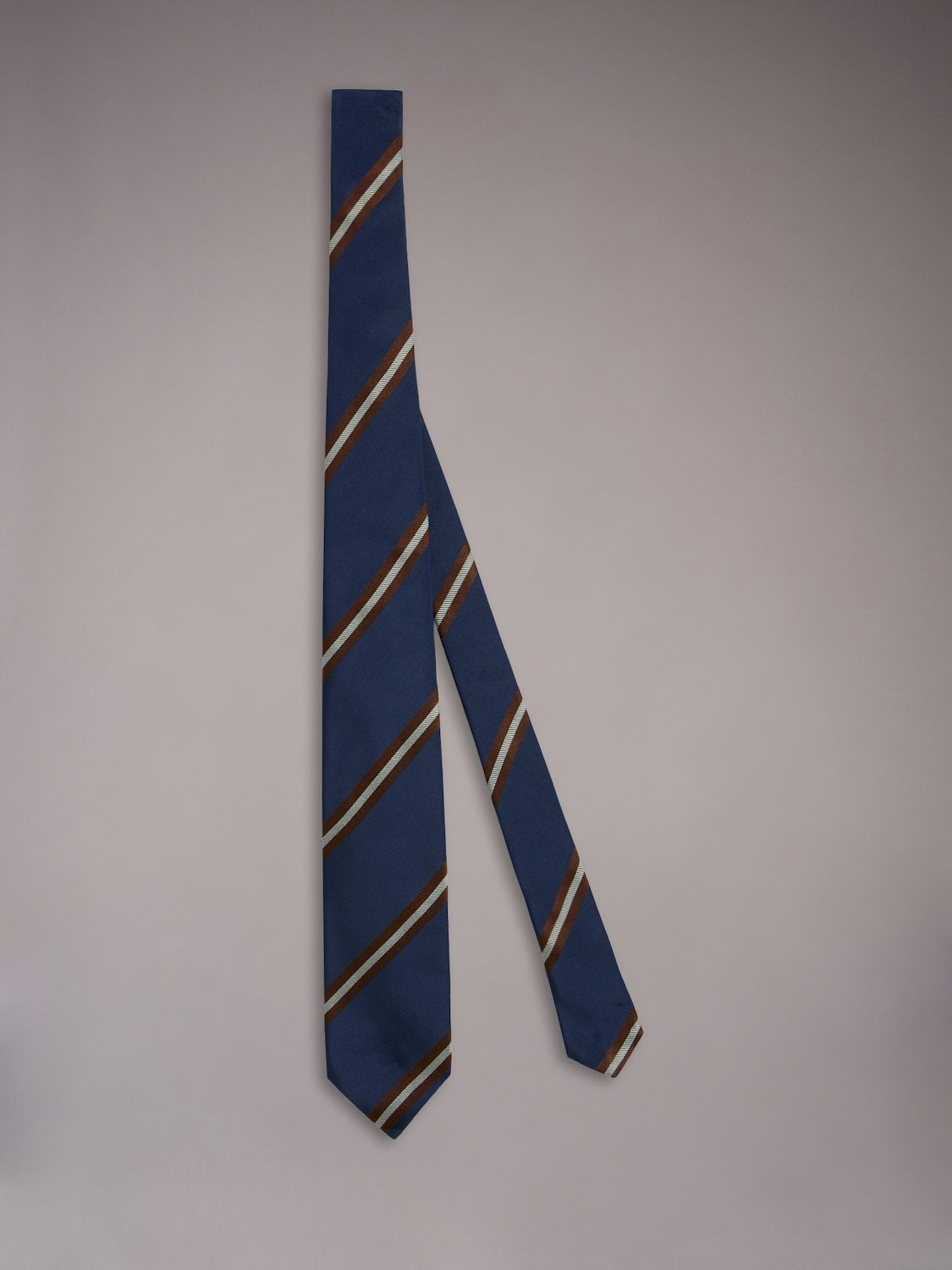 Seven-fold tie in blue silk with a regimental motif
