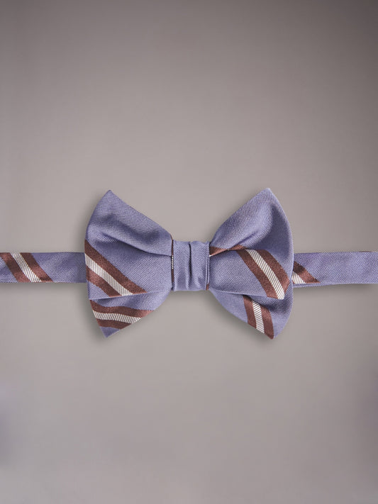 Self-tie bow tie in blue silk with a regimental motif