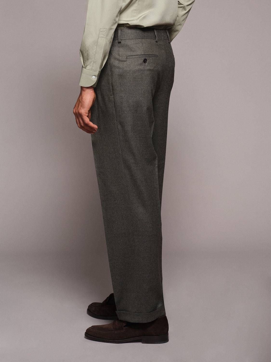 High-waisted trousers in green wool flannel