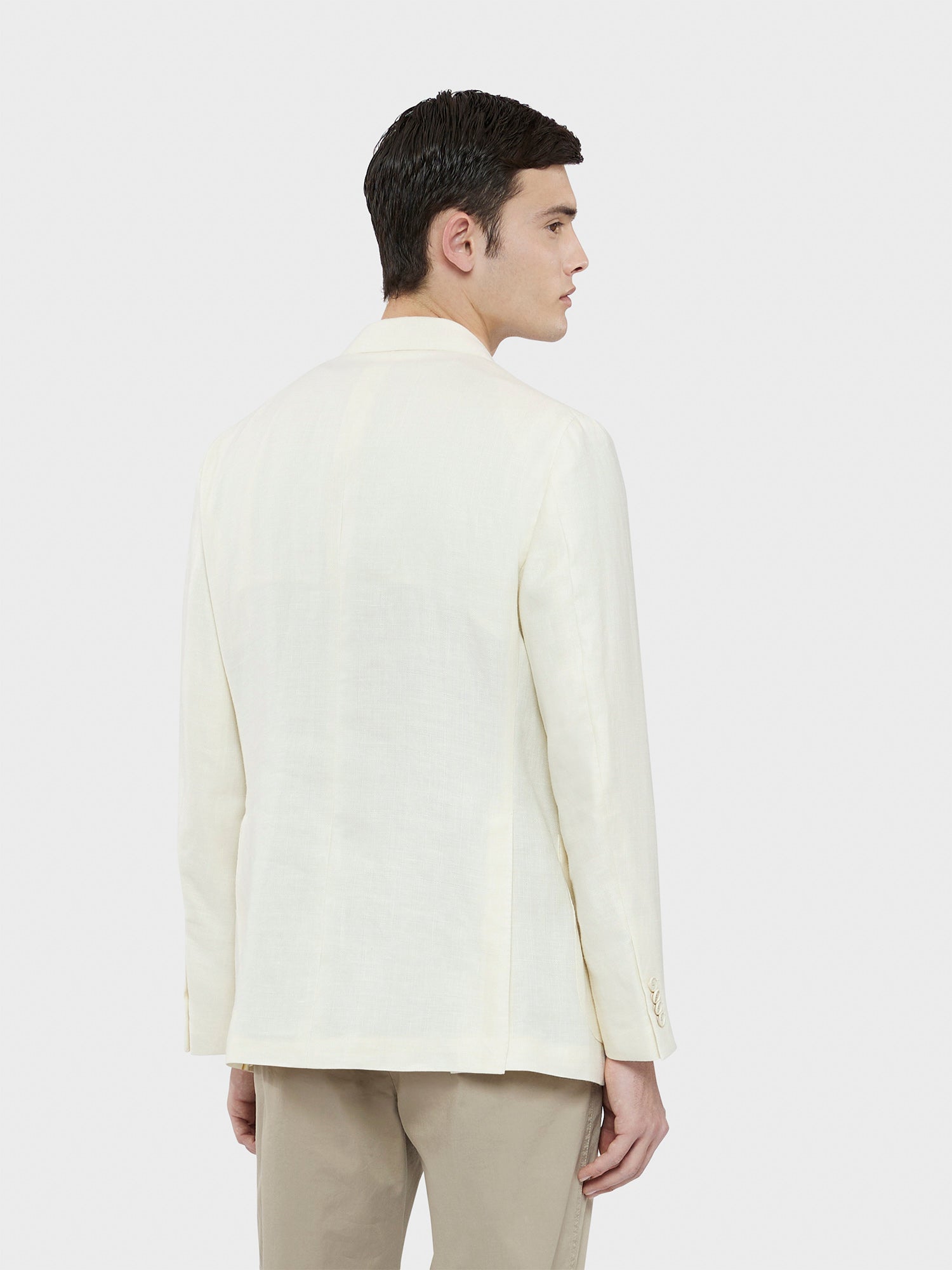 Caruso Menswear Abbigliamento Uomo Giacca Aida semisfoderata primaverile in lino lana bianco drop 8R indossato back